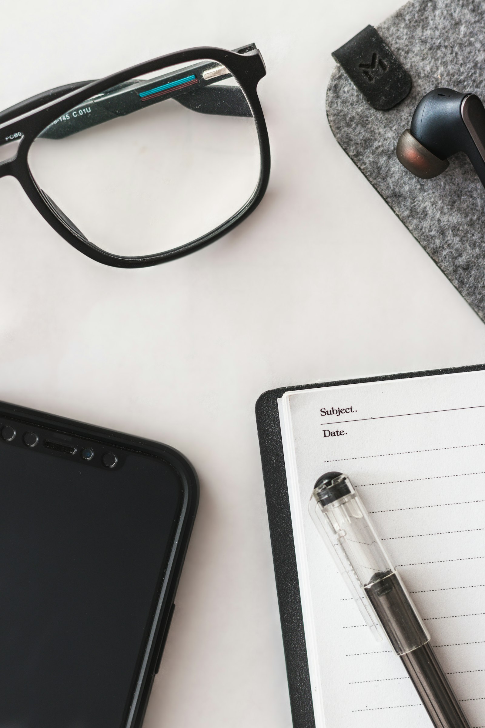Freelancer desk with printed invoices
